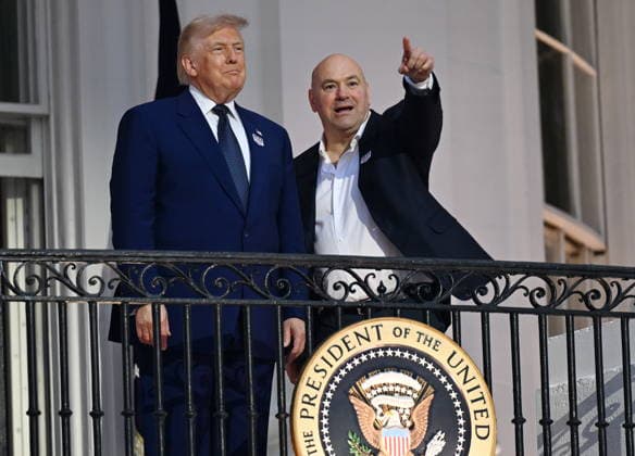 US President Donald Trump hosts UFC Freedom 250 at the White House US President Donald Trump (C) and UFC CEO Dana White (R) talk on the Blue Room balcony during the playing of the national anthem before the UFC Freedom 250 event on the South Lawn of the White House in Washington, DC, USA, 14 June 2026. The mixed martial arts event is being held as part of President Trump s 80th birthday weekend activities. WASHINGTON DC UNITED STATES  Copyright: xANNABELLExGORDONx xPOOLx