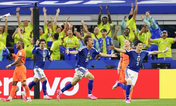 Football: 2026 World Cup Japan s Koki Ogawa (19) celebrates after Daichi Kamada (15) scores the team s second goal in the second half of a World Cup Group F football match against the Netherlands at Dallas Stadium in Arlington, Texas, on June 14, 2026.  A14AA0005618803P