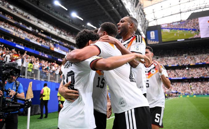 Soccer FIFA World Cup 2026 preliminary round group E in Houston Germany Curacao 14 06 2026 Germany celebrating after the goal to 2 1, from left, goal scorer Nico Schlotterbeck with Jonathan Tah