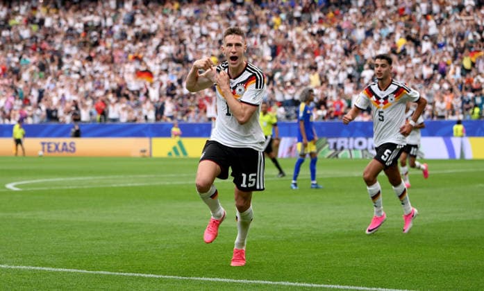 Soccer FIFA World Cup 2026 preliminary round group E in Houston Germany Curacao 14 06 2026 Germany celebrating after the goal to 2 1, from left, goal scorer Nico Schlotterbeck