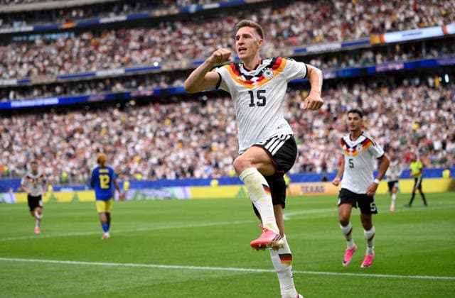 Soccer FIFA World Cup 2026 preliminary round group E in Houston Germany Curacao 14 06 2026 Germany celebrating after the goal to 2 1, from left, goal scorer Nico Schlotterbeck