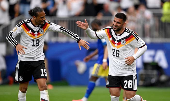 Soccer FIFA World Cup 2026 preliminary round group E in Houston Germany Curacao 14 06 2026 Germany celebrating after the goal to 6 1, from left, Leroy Sane, goal scorer Deniz Undav