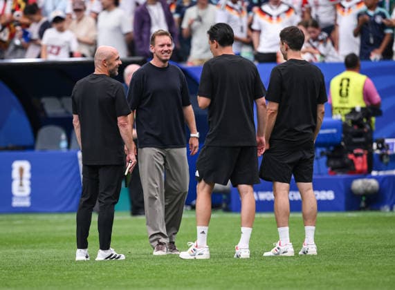 Football FIFA World Cup 2026 preliminary round Group E in Houston Germany Curacao 14 06 2026 The German coaching team in good spirits after the match and the 7 1 victory Co-coach Alfred Schreuder, national coach Julian Nagelsmann, co-coach Benjamin Hübner and co-coach Benjamin Glueck from left, all Germany