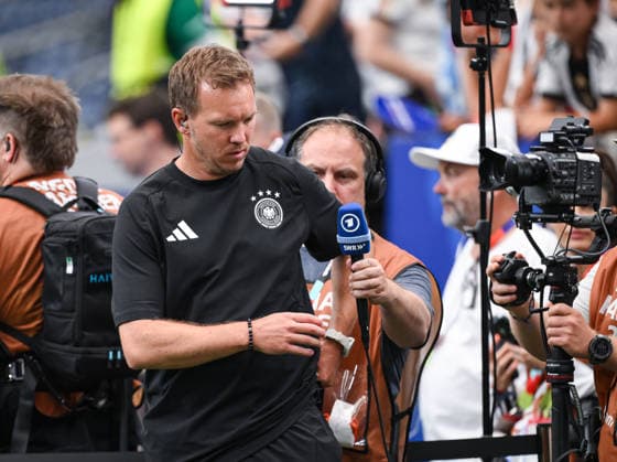 Football FIFA World Cup 2026 preliminary round Group E in Houston Germany Curacao 14 06 2026 German coach Julian Nagelsmann in the middle, Germany is handed an ARD microphone
