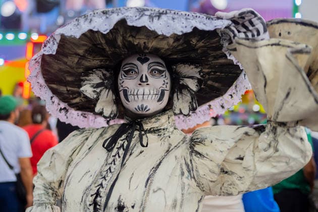 Fans During The FIFA World Cup, WM, Weltmeisterschaft, Fussball Pan Fest At Mexico Host Country A person wears a skull mask looks on during the FIFA World Cup Fan Fest in the main square Zocalo, during the celebrations of the 2026 FIFA World Cup in the Mexican host country. on June 14, 2026 in Mexico City, Mexico. (Photo by Marco Gonzalez Eyepix Group) Copyright: xMarcoxGonzalez xEyepixxGroupx MG_14062026_187192