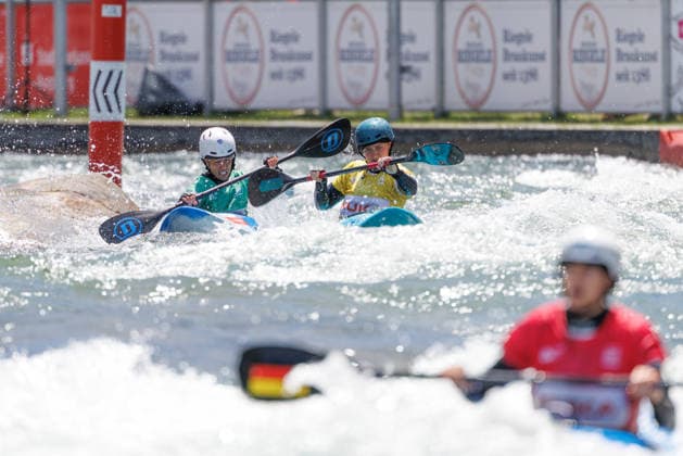 Ricarda Funk GER , Nikita Setchell GBR , Chiara Sabattini ITA , Leire Goni ESP at ICF CANOE SLALOM WORLD CUP, Canoeing, Women, Kayak Cross, 2026, on 14 06 2026 in Augsburg, Eiskanal Bayern Germany