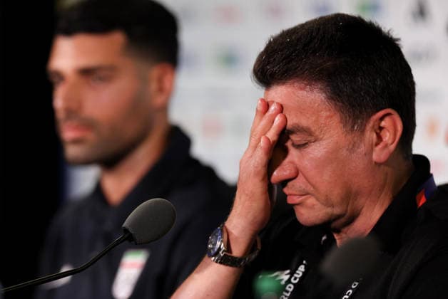 (260615) -- LOS ANGELES, June 15, 2026 -- Iran s head coach Amir Ghalenoei (R) and player Mehdi Taremi attend a press conference, PK, Pressekonferenz at Los Angeles Stadium in Los Angeles, the United States, on June 14, 2026. ) (SP)U.S.-LOS ANGELES-FOOTBALL FIFA World Cup, WM, Weltmeisterschaft, Fussball PRESS CONFERENCE-IRAN BaixXuefei 
