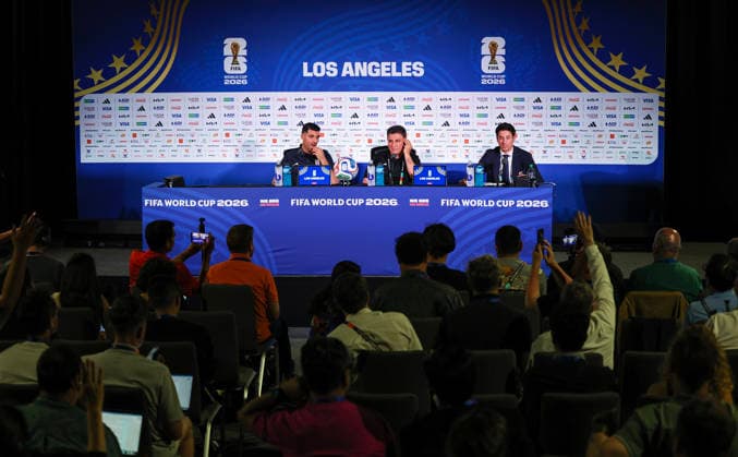 (260615) -- LOS ANGELES, June 15, 2026 -- Iran s head coach Amir Ghalenoei (C) and player Mehdi Taremi (L) attend a press conference, PK, Pressekonferenz at Los Angeles Stadium in Los Angeles, the United States, on June 14, 2026. ) (SP)U.S.-LOS ANGELES-FOOTBALL FIFA World Cup, WM, Weltmeisterschaft, Fussball PRESS CONFERENCE-IRAN BaixXuefei 