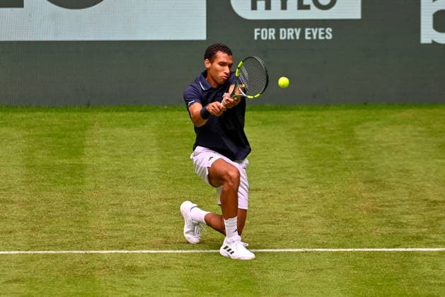 Felix Auger-Aliassime (CAN) hits a forehand while kneeling at the TERRA WORTMANN Open 2026, Tennis, ATP, Mens 500, Tournament, Main Draw, June 15, 2026, TERRA WORTMANN Open 2026, Tennis, ATP, Mens Tennis 500, Tournament, Main Draw, June 15, 2026, Indoor,detected_source_language Copyright: xEibner-Pressefoto RobertxGertzenx EP_RGN
