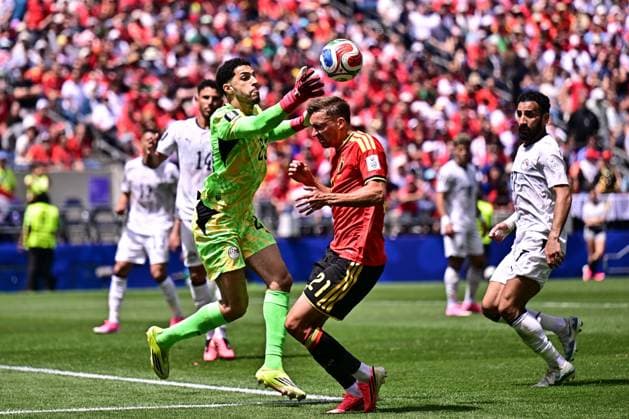 Egypt s goalkeeper Mostafa Shobeir and Belgium s Timothy Castagne fight for the ball during a soccer game between Belgian national team, Nationalteam Red Devils and Egypt, on Monday 15 June 2026 in Seattle, the first game in the group stage of the FIFA World Cup, WM, Weltmeisterschaft, Fussball 2026 in the United States of America. The Diables Rouges - Rode Duivels were drawn into Group G. DIRKxWAEM  x177812345x