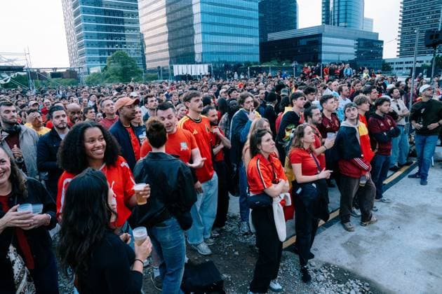 Supporters reacts as Belgian took a goal in the first half of a soccer game between Belgian national team, Nationalteam Red Devils and Egypt, on a big screen in Brussels, on Monday 15 June 2026, the first game in the group stage of the FIFA World Cup, WM, Weltmeisterschaft, Fussball 2026 in the United States of America. The Diables Rouges - Rode Duivels were drawn into Group G. MARIUS BURGELMAN MariusxBurgelman  x177813132x