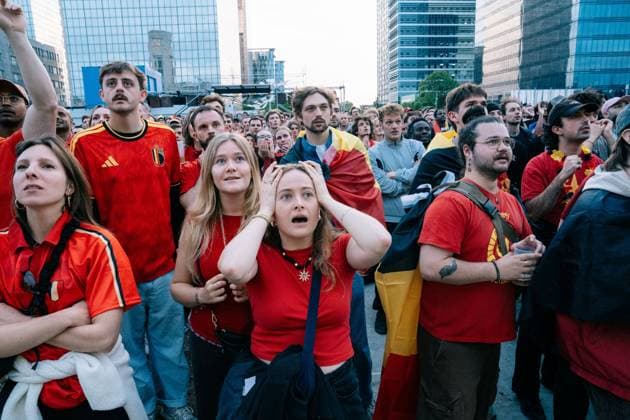 Supporters reacts as Belgian took a goal in the first half of a soccer game between Belgian national team, Nationalteam Red Devils and Egypt, on a big screen in Brussels, on Monday 15 June 2026, the first game in the group stage of the FIFA World Cup, WM, Weltmeisterschaft, Fussball 2026 in the United States of America. The Diables Rouges - Rode Duivels were drawn into Group G. MARIUS BURGELMAN MariusxBurgelman  x177813133x