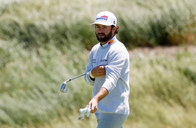 Cameron Young carries his putter while playing in a practice round on the Monday before the 126th U.S. Open Golf Championship at Shinnecock Hills Golf Club on Monday, June 15, 2026 in Southampton, New York.  NYP20260615308 JOHNxANGELILLO