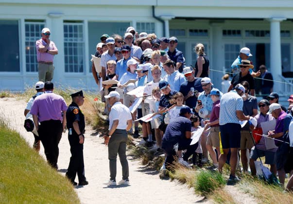 Patrick Reed signs autographs while playing in a practice round on the Monday before the 126th U.S. Open Golf Championship at Shinnecock Hills Golf Club on Monday, June 15, 2026 in Southampton, New York.  NYP20260615309 JOHNxANGELILLO