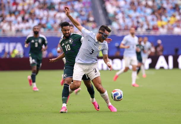 FIFA World Cup, WM, Weltmeisterschaft, Fussball 2026 - Group H - Saudi Arabia vs Uruguay Saudi Arabia midfielder Salem Al Dawsari (L) in action against Uruguay defender Sebastian Caceres during the FIFA World Cup 2026 group stage match Saudi Arabia against Uruguay, in Miami, Florida, USA, 15 June 2026. MIAMI United States  Copyright: xCRISTOBALxHERRERA-ULASHKEVICHx