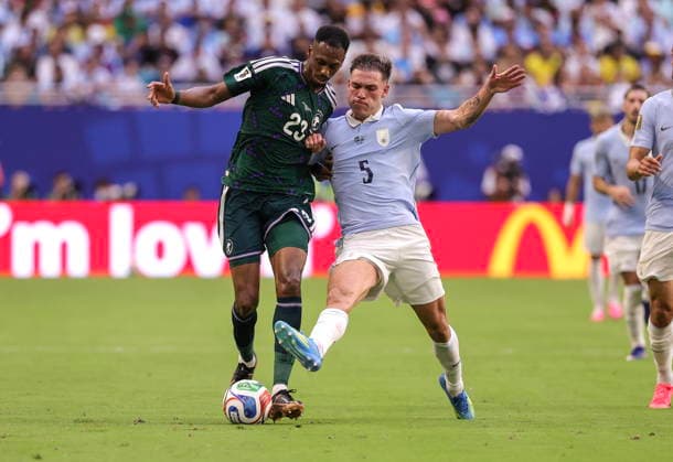 FIFA World Cup, WM, Weltmeisterschaft, Fussball 2026 - Group H - Saudi Arabia vs Uruguay Saudi Arabia midfielder Mohamed Kanno (L) in action against Uruguay midfielder Manuel Ugarte during the FIFA World Cup 2026 group stage match Saudi Arabia against Uruguay, in Miami, Florida, USA, 15 June 2026. MIAMI United States  Copyright: xCRISTOBALxHERRERA-ULASHKEVICHx
