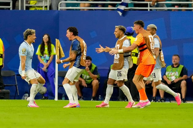Maxi Araujo of Uruguay celebrates after scoring his teams first goal with his teammates during the 2026 FIFA World Cup Group H match between Saudi Arabia and Uruguay at Miami Stadium on June 15, 2026, in Miami, United States. Photo by Alex Gottschalk, DeFodi Images,detected_source_language