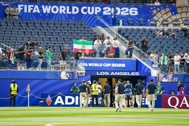 USA Soccer 2026 FIFA World Cup Group Stage Group G Iran vs. New Zealand SoFi Stadium, Inglewood, Los Angeles County, California Fans and members of the Iranian diaspora display historic Iranian flags featuring the lion and sun symbol during the pitch inspection ahead of the 2026 FIFA World Cup group stage match between Iran and New Zealand at SoFi Stadium,detected_source_language Copyright: xJOERANxSTEINSIEKx