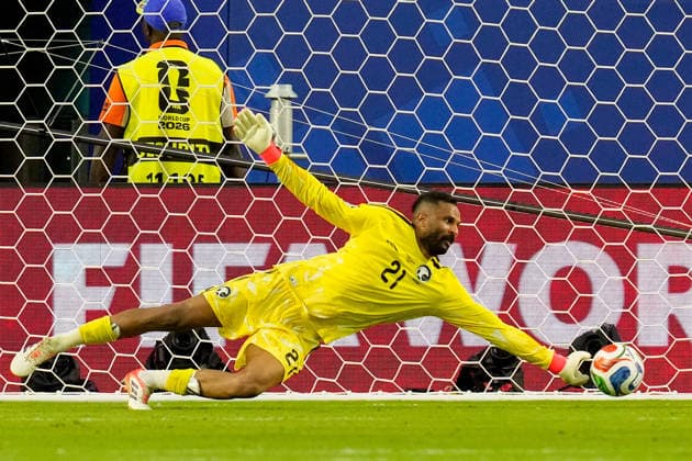 Goalkeeper Mohammed Alowais of Saudi Arabia makes a save during the 2026 FIFA World Cup Group H match between Saudi Arabia and Uruguay at Miami Stadium on June 15, 2026, in Miami, United States. Photo by Alex Gottschalk, DeFodi Images,detected_source_language