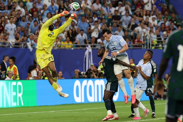 MIAMI GARDENS, FL - JUNE 15: Mohammed al-Owais 21 of Saudi Arabia and Federico Vinas 21 of Uruguay battle for the ball during a FIFA World Cup, WM, Weltmeisterschaft, Fussball 2026 Group H match between Saudi Arabia and Uruguay on June 15, 2026 at Miami Stadium, in Miami Gardens, Fla.(Photo by Chris Arjoon Icon Sportswire) SOCCER: JUN 15 FIFA World Cup 26 Group H - Saudi Arabia vs Uruguay EDITORIAL USE ONLY Icon26061500100037