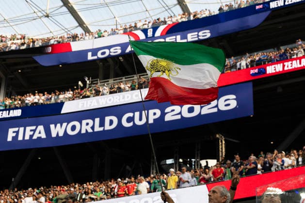 June 15, 2026, Los Angeles, California, USA: A soccer fan waves a flag during the FIFA World Cup, WM, Weltmeisterschaft, Fussball Group G soccer match between the IR Iran and the New Zealand at SoFi Stadium in Inglewood, Calif., Monday, June 15, 2026. Los Angeles USA - ZUMAc68_ 20260615_zaf_c68_045 Copyright: xRingoxChiux