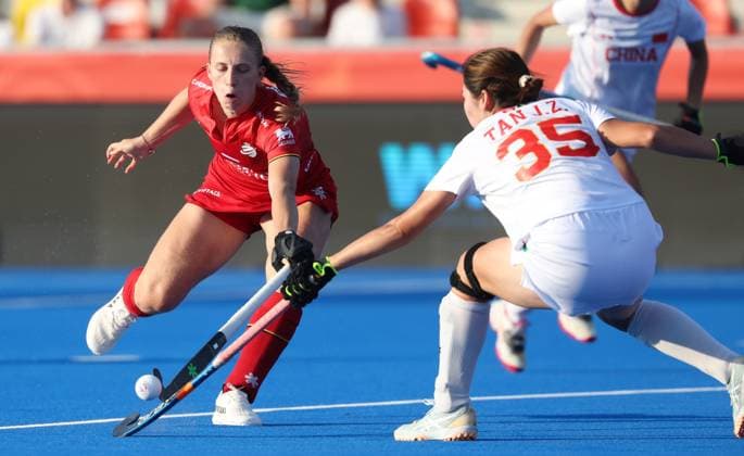 Belgium s Justine Rasir and China s Jinzhuang Tan fight for the ball during a hockey game between Belgian national team, Nationalteam Red Panthers and China, Tuesday 16 June 2026 in Wavre, match 10 16 in the group stage of the women s FIH Pro League competition. VIRGINIExLEFOUR  x177870925x