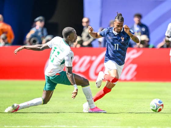 Nicolas Jackson of Senegal and Michael Olise of France battle for the ball during the 2026 FIFA World Cup Group I match between France and Senegal at New York New Jersey Stadium on June 16, 2026, in East Rutherford, United States. Photo by Harry Langer, DeFodi Images,detected_source_language
