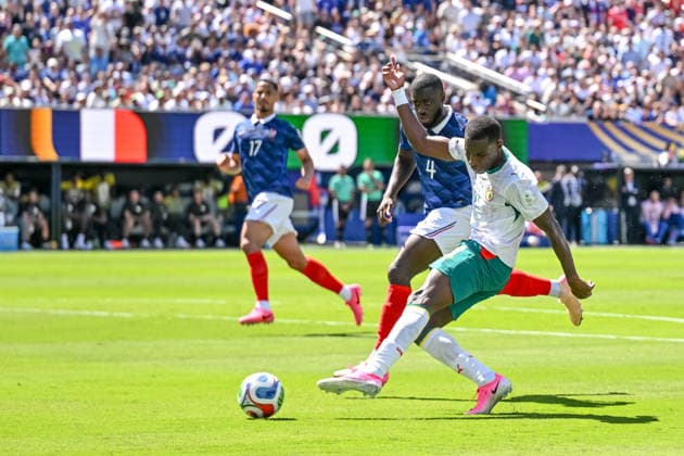 Dayot Upamecano of France and Nicolas Jackson of Senegal battle for the ball during the 2026 FIFA World Cup Group I match between France and Senegal at New York New Jersey Stadium on June 16, 2026, in East Rutherford, United States. Photo by Harry Langer, DeFodi Images,detected_source_language