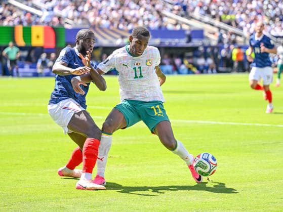 Dayot Upamecano of France and Nicolas Jackson of Senegal battle for the ball during the 2026 FIFA World Cup Group I match between France and Senegal at New York New Jersey Stadium on June 16, 2026, in East Rutherford, United States. Photo by Harry Langer, DeFodi Images,detected_source_language