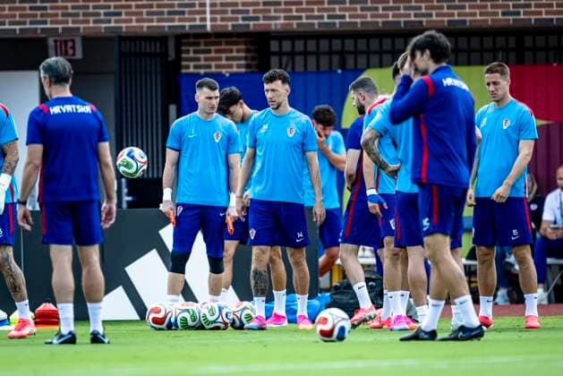 DALLAS — Croatia goalkeeper Dominik Livakovic and Ivan Perisic during the 2026 World Cup; Croatia training at Washburne Soccer and Track Stadium on June 16, 2026, in Dallas, United States. Photo by Stefan Koops, EYE4IMAGES, DeFodi Images,detected_source_language