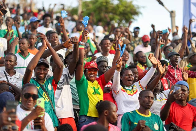 Senegal fans watch team s World Cup debut on giant screen DAKAR, SENEGAL - JUNE 16: Senegal fans watch their national team, Nationalteam s 2026 FIFA World Cup, WM, Weltmeisterschaft, Fussball Group I match against France on a giant screen set up at the African Renaissance Monument in Dakar, Senegal, on June 16, 2026. Hundreds of supporters gathered at the square ahead of kickoff, waving Senegalese flags and wearing national team jerseys as they followed the match. Cem Ozdel Anadolu Dakar Senegal. Editorial use only. Please get in touch for any other usage.  Copyright: x2026xAnadoluxCemxOzdelx
