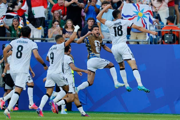 Iraq forward Ayman Hussein right celebrates his goal against Norway during the first half of their FIFA World Cup, WM, Weltmeisterschaft, Fussball match at Gillette Stadium in Foxborough, Massachusetts, on Tuesday, June 16, 2026.  BOP20260616014 CJxGUNTHER