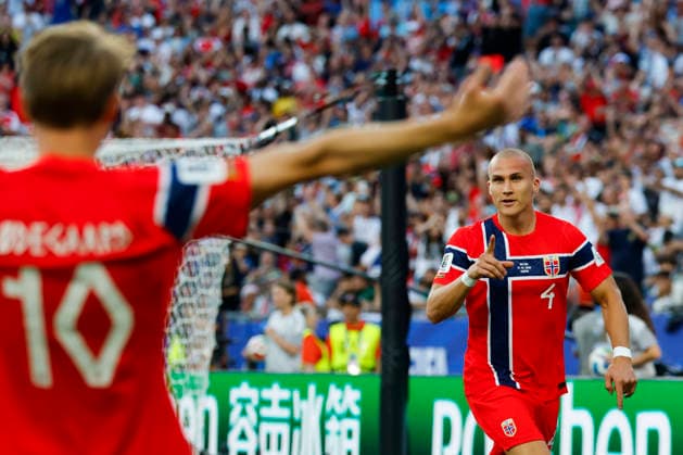 Norway defender Leo Ostigard right celebrates his goal against Iraq with Norway midfielder Martin Odegaard left during the second half of their FIFA World Cup, WM, Weltmeisterschaft, Fussball match at Gillette Stadium in Foxborough, Massachusetts, on Tuesday, June 16, 2026.  BOP20260616024 CJxGUNTHER