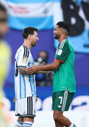 (260617) -- KANSAS CITY, June 17, 2026 -- Lionel Messi (L) of Argentina greets Riyad Mahrez of Algeria before the group J match between Argentina and Algeria at the FIFA World Cup, WM, Weltmeisterschaft, Fussball 2026 at Kansas City Stadium in Kansas City, the United States, June 16, 2026. ) (SP)U.S.-KANSAS CITY-FOOTBALL-FIFA WORLD CUP-GROUP J-ARG VS ALG LixMing 