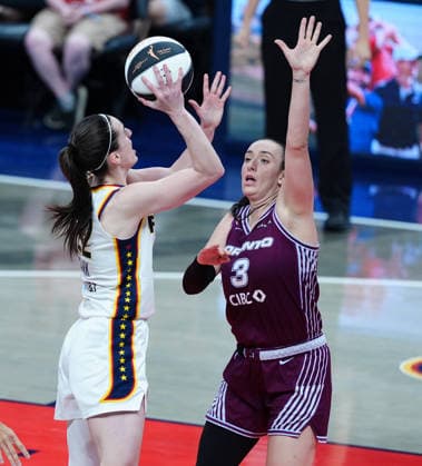 INDIANAPOLIS, IN - JUNE 16: Indiana Fever guard Caitlin Clark (22) takes a shot against Toronto Tempo guard Marina Mabrey (3) on June 16, 2026, at Gainbridge Fieldhouse in Indianapolis, Indiana. (Photo by Brian Spurlock Icon Sportswire) WNBA, Basketball Damen, USA JUN 16 Toronto Tempo at Indiana Fever EDITORIAL USE ONLY Icon26061641