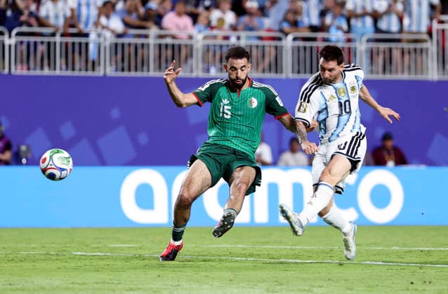 (260617) -- KANSAS CITY, June 17, 2026 -- Lionel Messi (R) of Argentina vies with Rayan Ait-nouri of Algeria during the group J match between Argentina and Algeria at the FIFA World Cup, WM, Weltmeisterschaft, Fussball 2026 at Kansas City Stadium in Kansas City, the United States, June 16, 2026. ) (SP)U.S.-KANSAS CITY-FOOTBALL-FIFA WORLD CUP-GROUP J-ARG VS ALG LixMing 