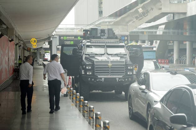 A SWAT team vehicle is parked in front of the arrivals area at Sanya Airport, Hainan Island, China, FIA Formula E World Championship Season 12, Sanya E-Prix, China, June 17, 2026, Security ,detected_source_language