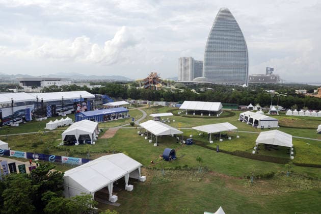 Tents behind the grandstand near Turn 1, with the Atlantis Sanya Hotel in the background, Hainan Island, China, FIA Formula E World Championship Season 12, Sanya E-Prix, China, June 17, 2026, preparations ,detected_source_language