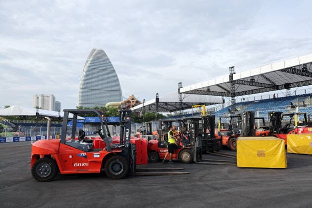 Forklift truck carrying DHL cargo crates at Turn 1 of the racetrack in front of the Atlantis Hotel, Hainan Island, China, FIA Formula E World Championship Season 12, Sanya E-Prix, China, June 17, 2026, preparations,detected_source_language