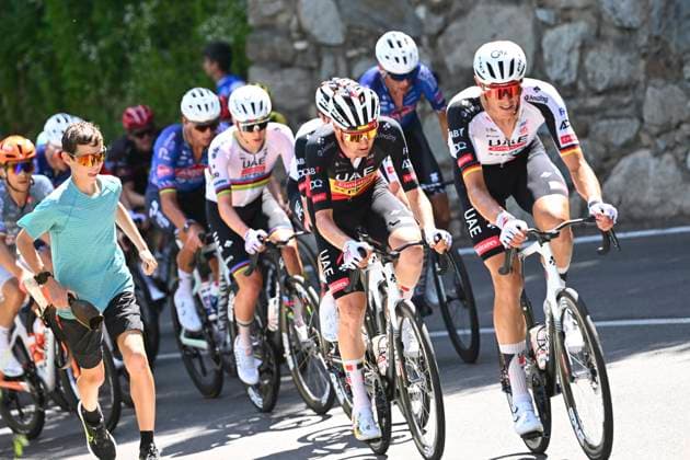 Tour de Suisse 2026 Stage 1 SONDRIO, ITALY - JUNE 17 : Politt Nils (GER) of UAE Team Emirates - XRG; Wellens Tim (BEL) of UAE Team Emirates - XRG, Pogacar Tadej (SLO) of UAE Team Emirates - XRG during stage 1 of the 89th edition of Tour de Suisse an UCI World Tour 2.UWT cycling road race stage for Men Elite of 144 km with start in Sondrio and finish in Sondrio on June 17, 2026 in Sondrio, Italy, 17 06 2026 ( Motordriver Guy De Vuyst - Sondrio Italy  Copyright: xVincentxKalutx
