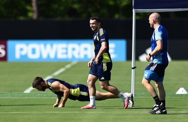 Grant Hanley of Scotland and John McGinn of Scotland Scotland Training and press conference, PK, Pressekonferenz 2026 FIFA World Cup, WM, Weltmeisterschaft, Fussball Football, Atrium Health Performance Park, Charlotte, USA - 17 Jun 2026Charlotte Atrium Health Performance Park United States of America EDITORIAL USE ONLY No use with unauthorised audio, video, data, fixture lists, club league logos or live services. Online in-match use limited to 120 images, no video emulation. No use in betting, games or single club league player publications.  Copyright: xMichaelxZemanek Shutterstockx 16928927u