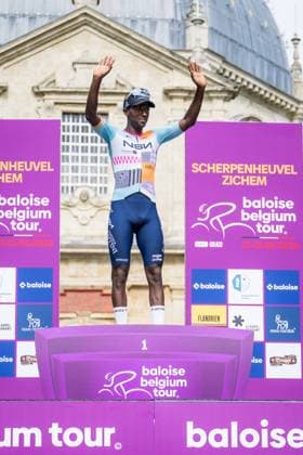 Eritrean Biniam Girmay of NSN Cycling Team celebrates on the podium after winning stage 1 of the Baloise Belgium Tour cycling race, 187,9 km with start and finish in Scherpenheuvel-Zichem, Wednesday 17 June 2026. The Baloise Belgium Tour takes place from 17 to 21 June. JASPERxJACOBS  x177947290x