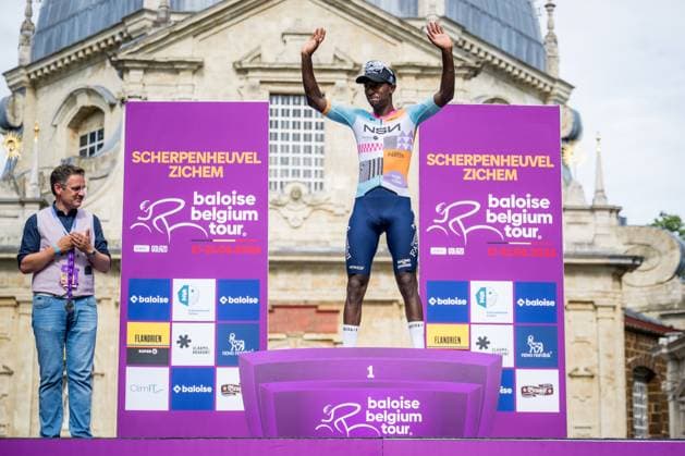 Eritrean Biniam Girmay of NSN Cycling Team celebrates on the podium after winning stage 1 of the Baloise Belgium Tour cycling race, 187,9 km with start and finish in Scherpenheuvel-Zichem, Wednesday 17 June 2026. The Baloise Belgium Tour takes place from 17 to 21 June. JASPERxJACOBS  x177947447x