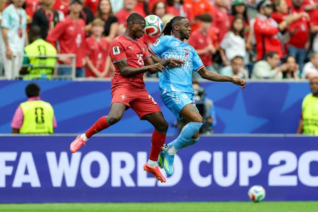 Nuno Mendes of Portugal and Aaron Wan-Bissaka of the Democratic Republic of the Congo battle for the ball during the 2026 FIFA World Cup Group K match between Portugal and the Democratic Republic of the Congo at Houston Stadium on June 17, 2026, in Houston, United States. Photo by Torbjorn Tande, DeFodi Images,detected_source_language