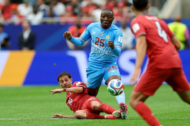 Bernardo Silva of Portugal and Edo Kayembe of the DR Congo battle for the ball during the 2026 FIFA World Cup Group K match between Portugal and the DR Congo at Houston Stadium on June 17, 2026, in Houston, United States. Photo by Torbjorn Tande, DeFodi Images,detected_source_language