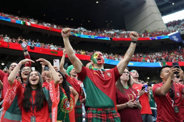 (260618) -- HOUSTON, June 18, 2026 -- Fans of Portugal cheer before the group K match between Portugal and the Democratic Republic of the Congo (DRC) at the 2026 FIFA World Cup, WM, Weltmeisterschaft, Fussball at Houston Stadium in Houston, the United States, June 17, 2026. ) (SP)U.S.-HOUSTON-FOOTBALL-FIFA WORLD CUP-GROUP K-POR VS COD ZhangxChen 