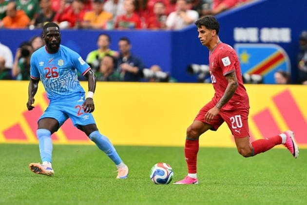 FIFA World Cup, WM, Weltmeisterschaft, Fussball 2026 - Group K - Portugal vs DR Congo Arthur Masuaku (L) of DR Congo and Joao Cancelo of Portugal in action during the FIFA World Cup 2026 group stage match Portugal against Democratic Republic of Congo, in Houston, USA, 17 June 2026. HOUSTON United States  Copyright: xSAMxWASSONx