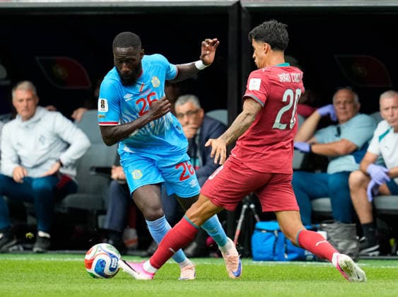 Arthur Masuaku (DR Congo), 26, in a tackle with Joao Cancelo (Portugal), 20, USA, FIFA World Cup, Portugal vs. DR Congo, Houston, June 17, 2026, USA, FIFA World Cup, Portugal vs. DR Congo, Houston, June 17, 2026, Houston,detected_source_language Copyright: xEibner-Pressefoto ScottxColemanx EP_SCN