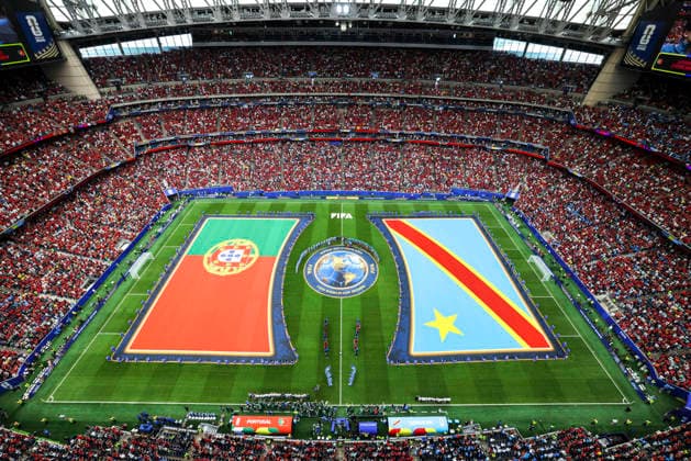 (260618) -- HOUSTON, June 18, 2026 -- Players of both teams line up before the group K match between Portugal and the Democratic Republic of the Congo (DRC) at the 2026 FIFA World Cup, WM, Weltmeisterschaft, Fussball at Houston Stadium in Houston, the United States, June 17, 2026. ) (SP)U.S.-HOUSTON-FOOTBALL-FIFA WORLD CUP-GROUP K-POR VS COD XuxZijian 