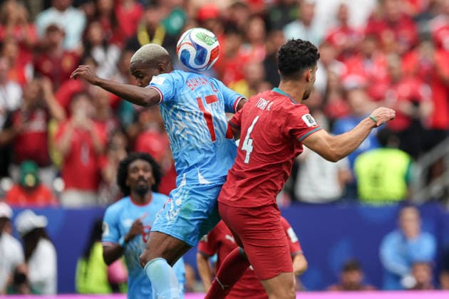 HOUSTON, TX - JUNE 17: Cedric Bakambu 17 of DR Congo and Tomas Araujo 4 of Portugal challenge each other for a header during the FIFA World Cup, WM, Weltmeisterschaft, Fussball 2026 Group K match between Portugal and Congo DR on June 17, 2026, at Houston Stadium in Houston, Texas. (Photo by David Buono Icon Sportswire) SOCCER: JUN 17 FIFA World Cup 26 Group K - Portugal vs Congo DR EDITORIAL USE ONLY Icon260617040
